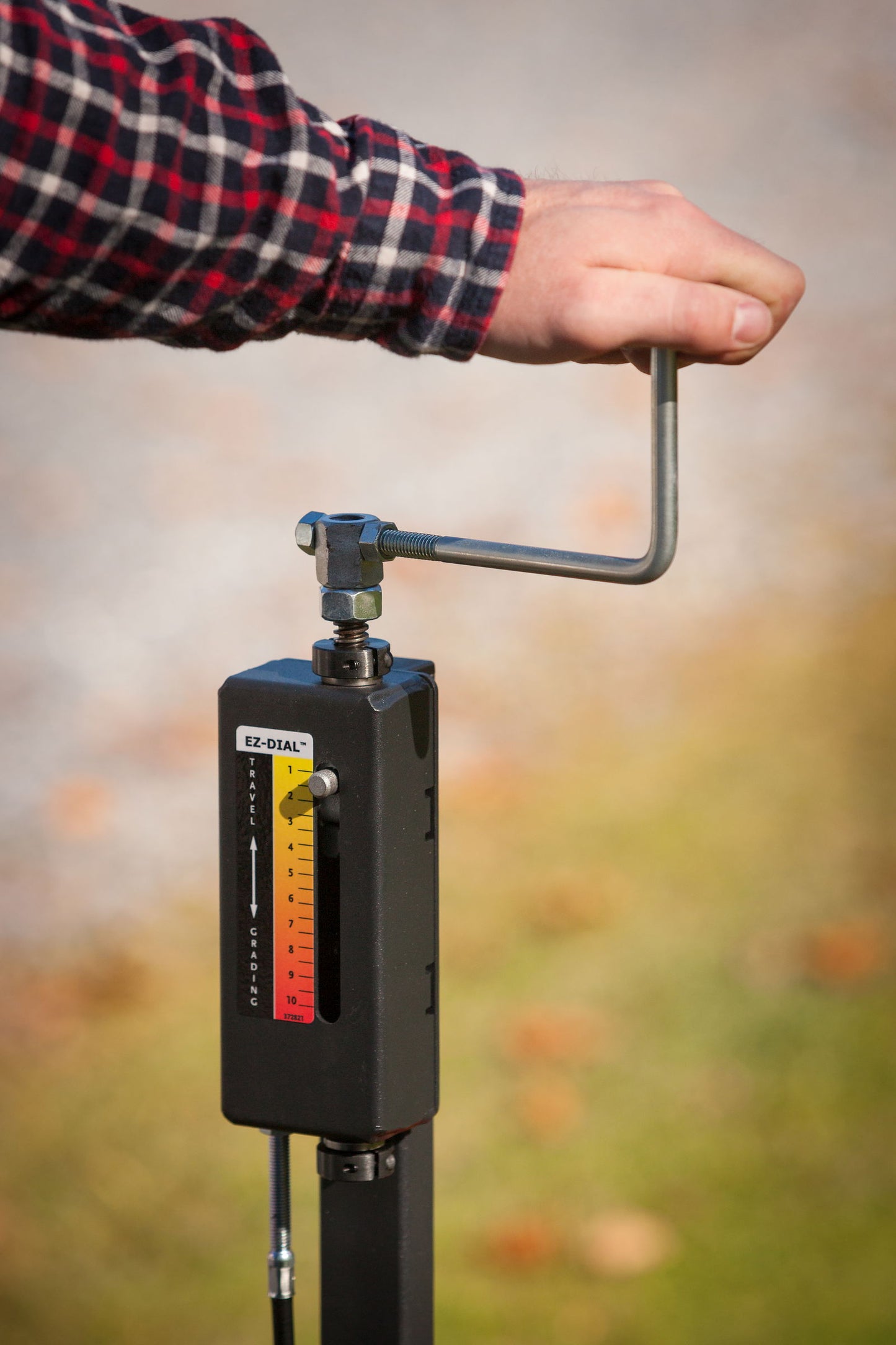 Veihøvel fra DR Power vist med sveiv ute